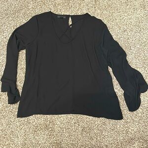 Sheer criss cross neck top